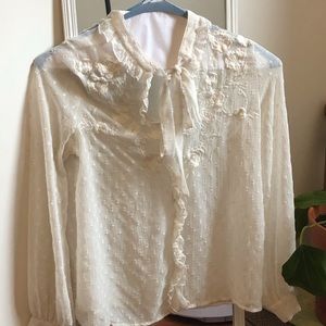 Sheer, tie front cream blouse